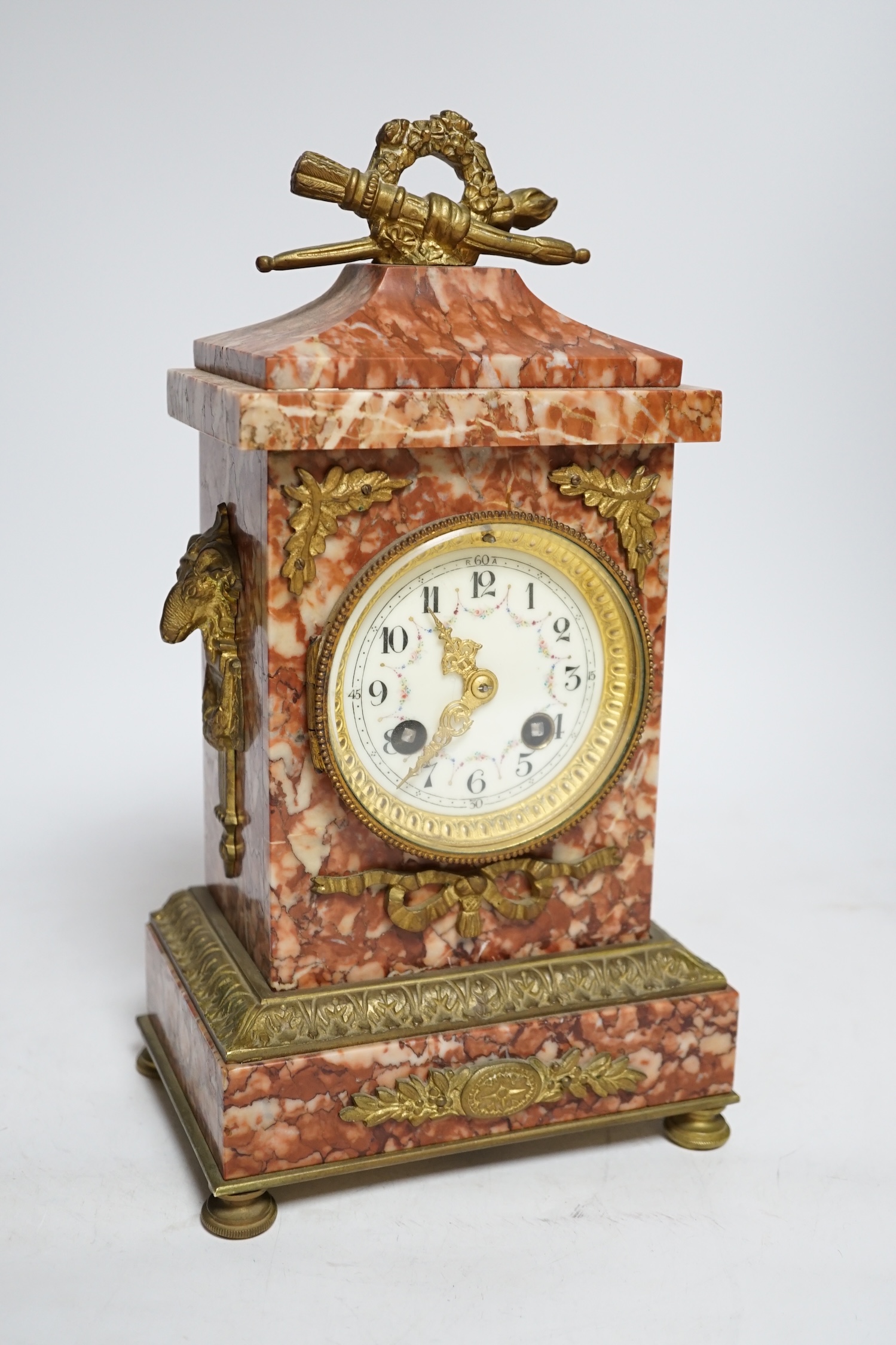 A mid-19th century rouge marble mantel clock, L. Marti et Cie Medaille D’argent two train movement, striking on a bell (bell missing), 29.5cm